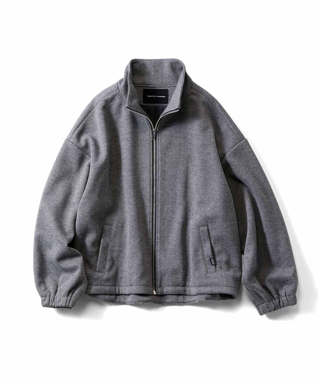 THREE FIFTY STANDARD ヘリンボーン柄のジップブルゾン〈グレー