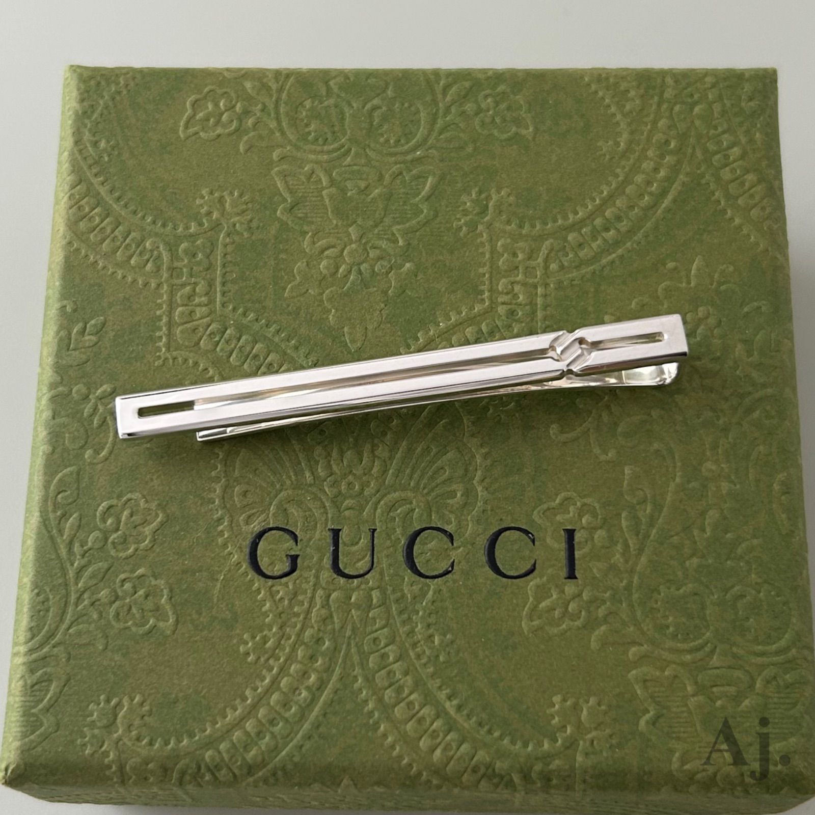 GUCCIインフィニティノットシルバーネクタイピンAg925