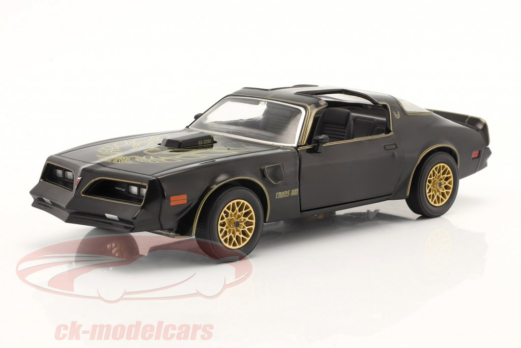 Greenlight 1:24 Pontiac Firebird TransAm year 1977 black / gold