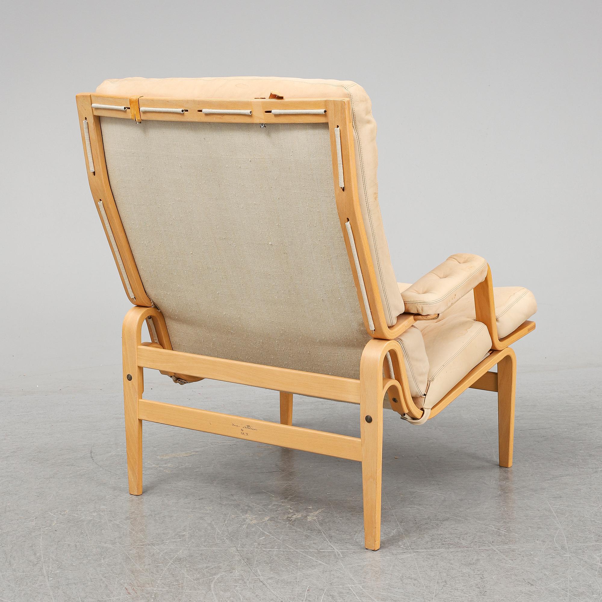 BRUNO MATHSSON, 'Ingrid high' easy chair, DUX. - Bukowskis