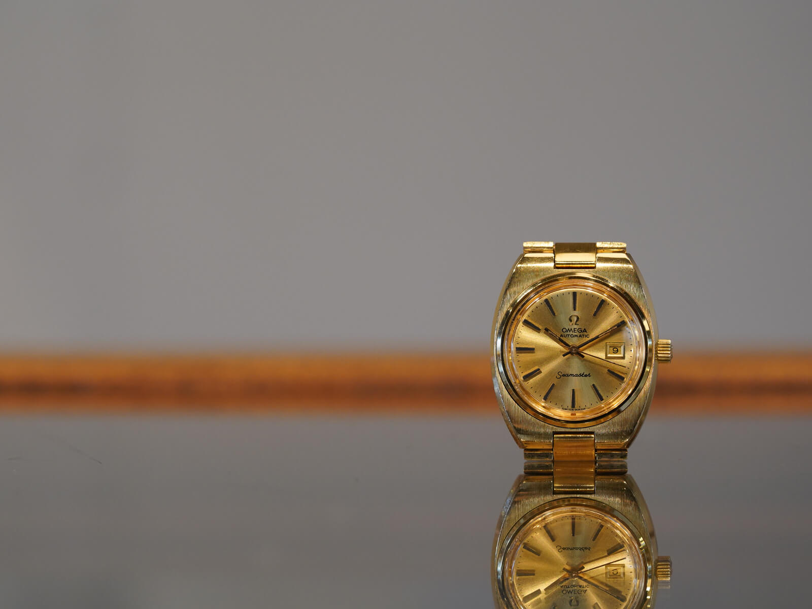 オメガ/シーマスターデイト/ゴールドダイヤル/キャップゴールド/自動