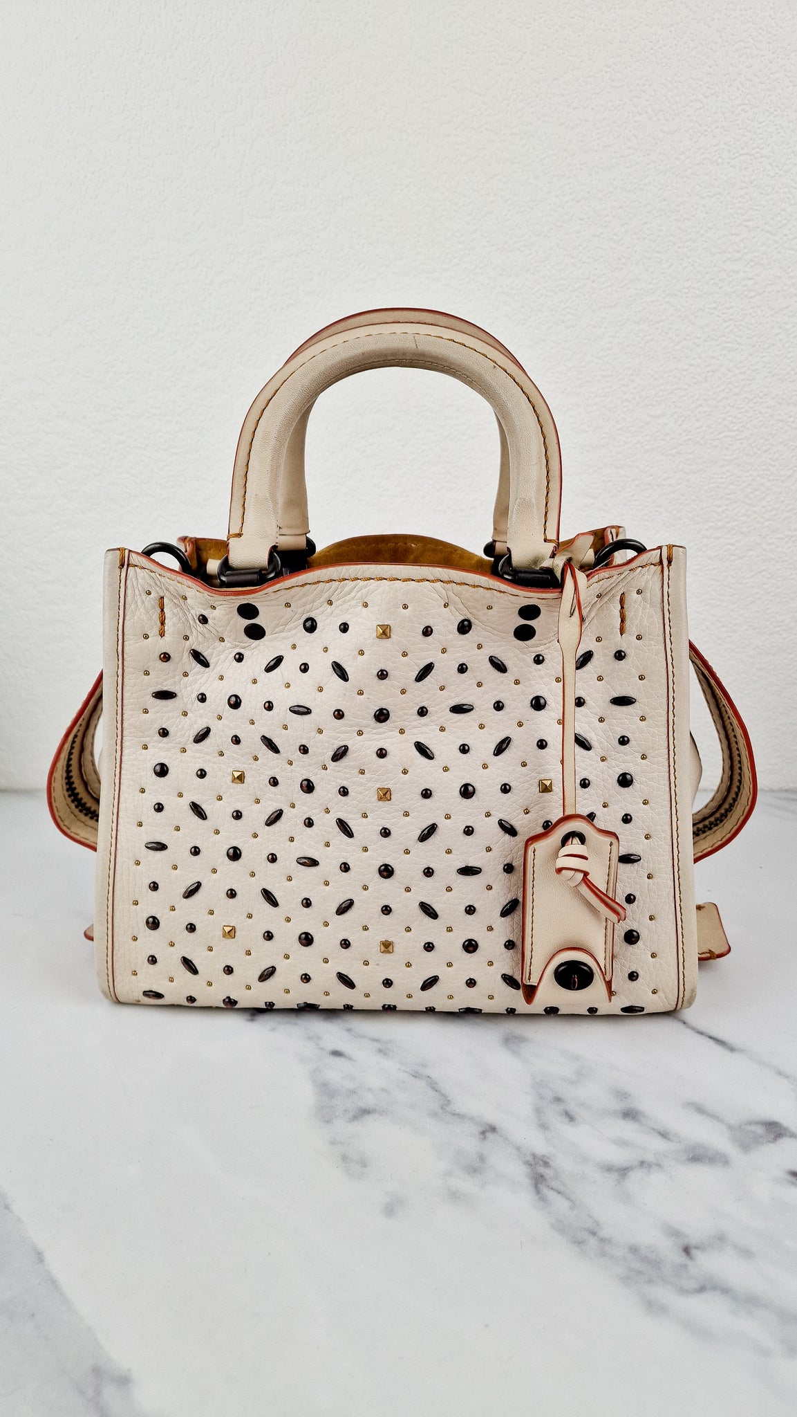 Coach 1941 Rogue 25 in Chalk White With Pyramid Prairie Rivets