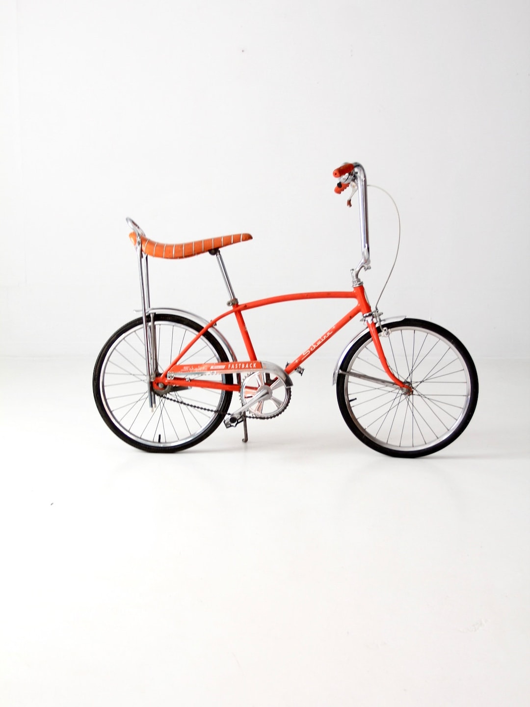 The Schwinn Stingray Circa 1972 - Orange Saddle Seat Bicycle
