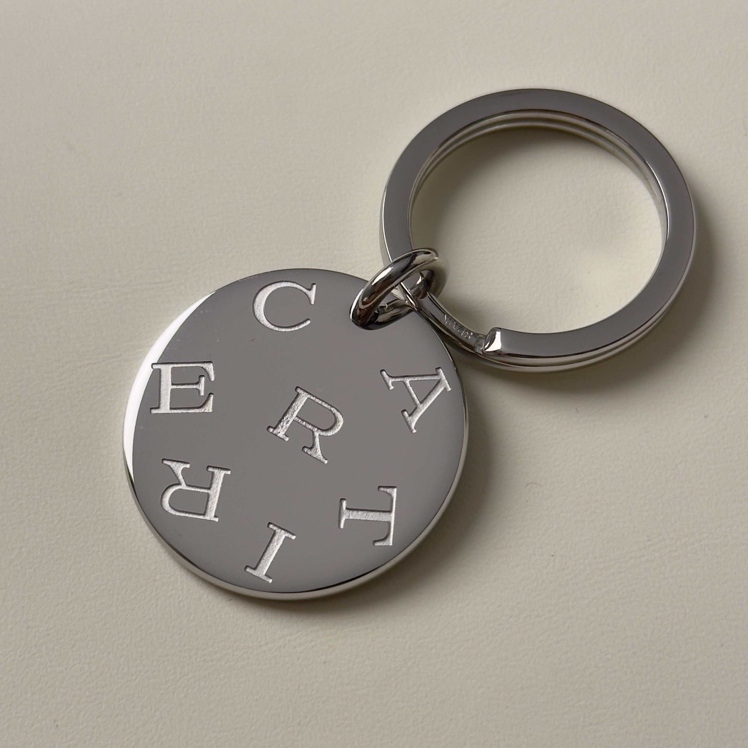 Cartier Luxury Polished Silver Keychain with Logo Engraving