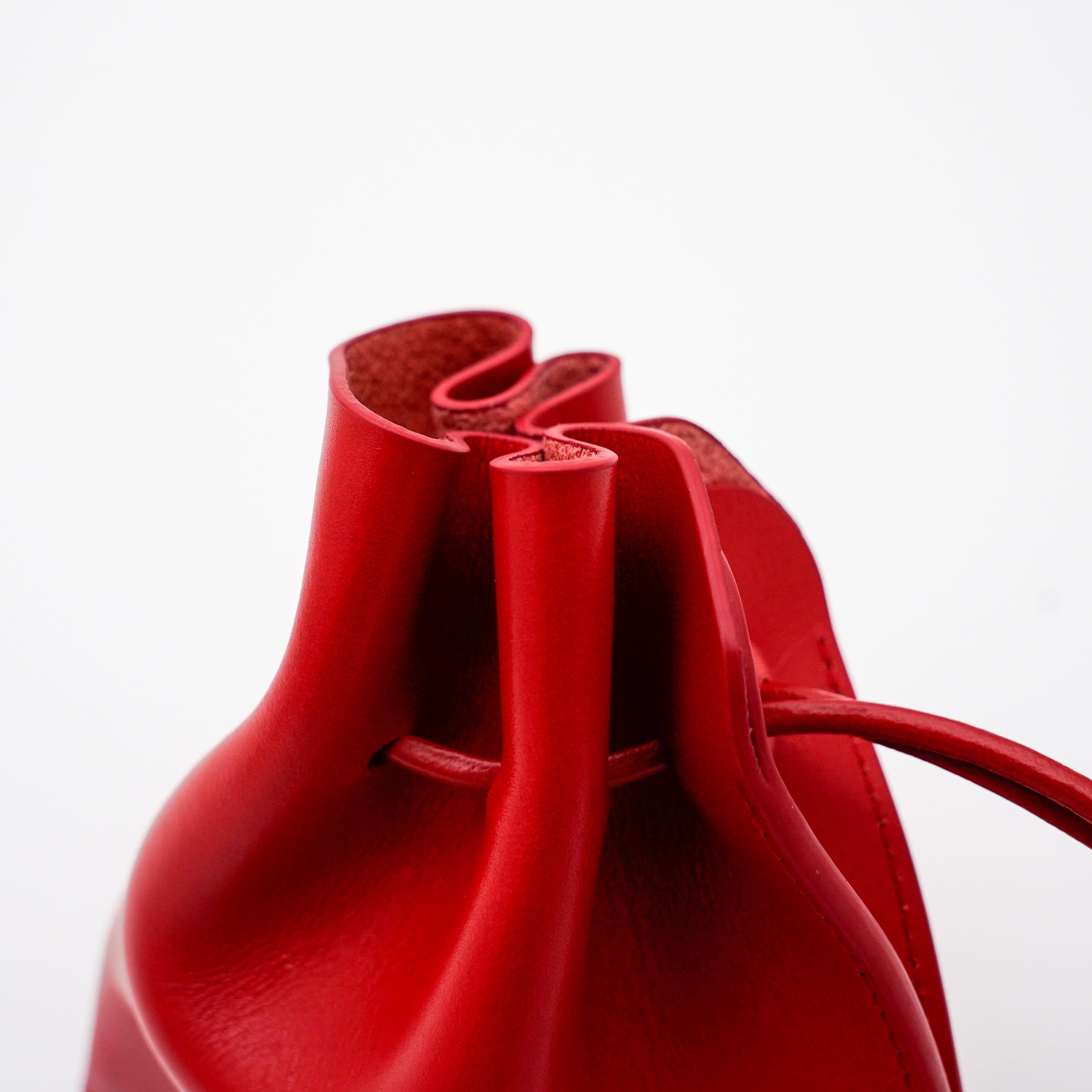 HERRIE KINCHAKU POUCH - XXS / RAPTO FLEX｜レザー ミニ巾着ポーチ 首