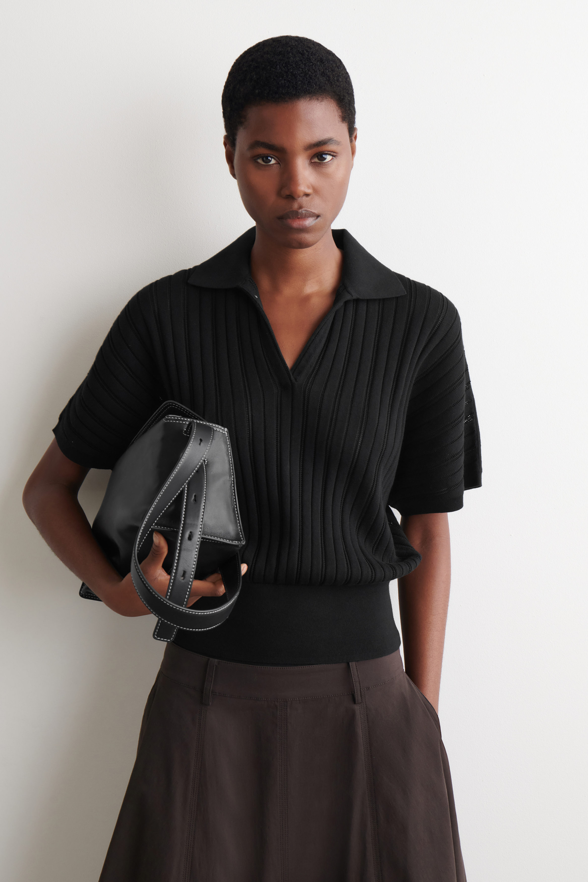 POINTELLE-KNIT COTTON POLO TOP - BLACK | COS US