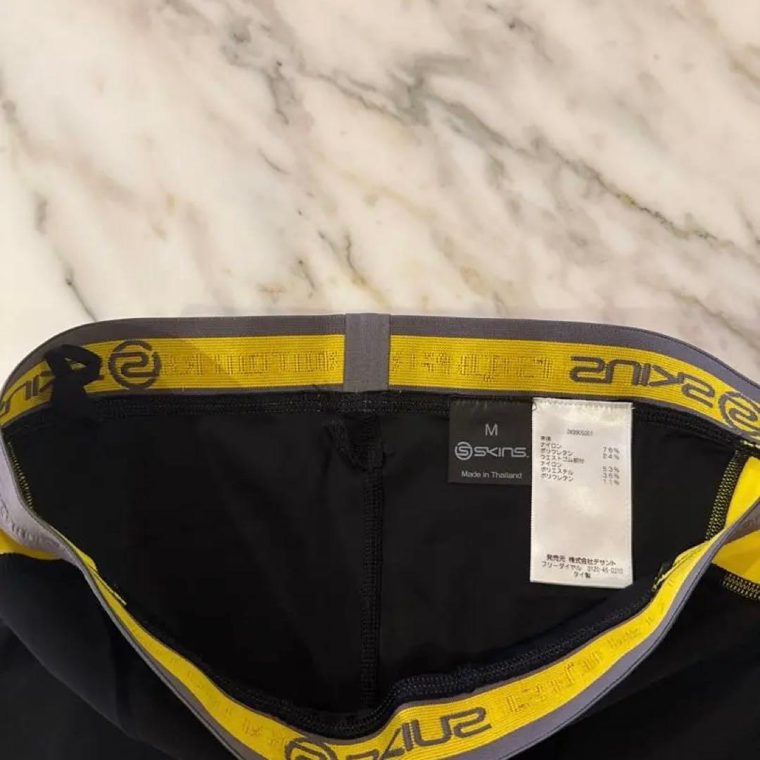 DNAMIC DK9905001 ロングタイツ 黒×黄 デサント国内正規 ECM