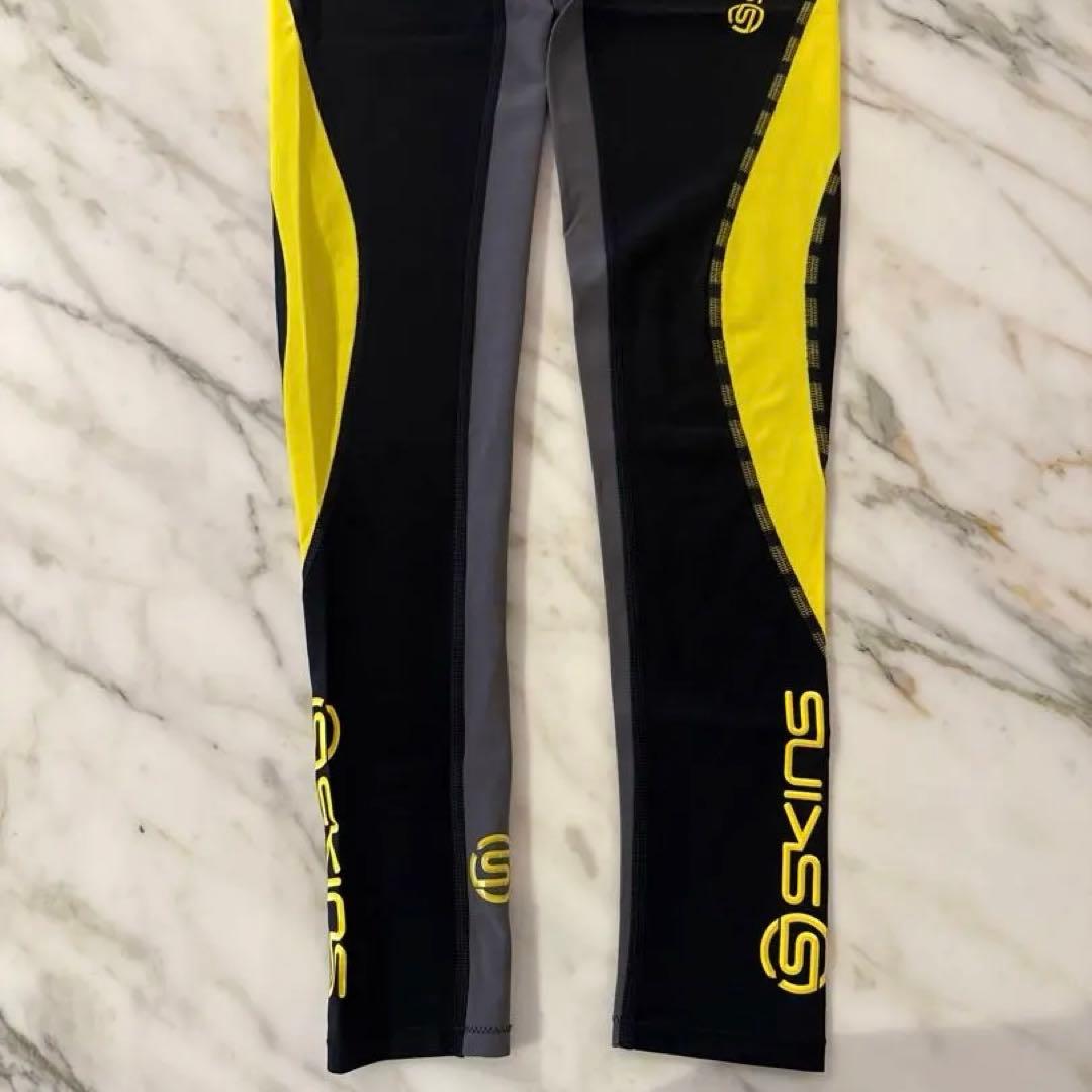 DNAMIC DK9905001 ロングタイツ 黒×黄 デサント国内正規 ECM