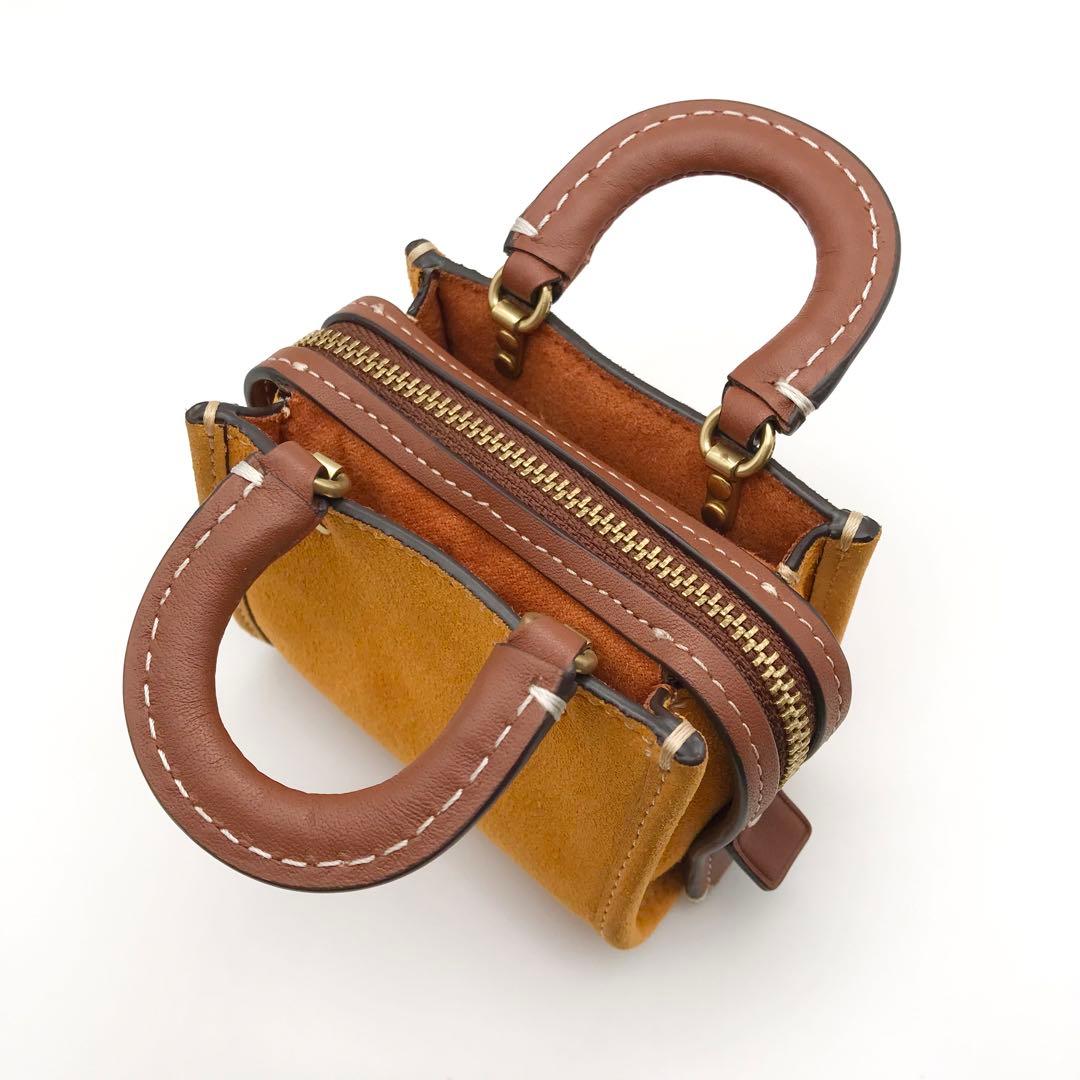 COACH チャーム ☆大人気☆ ミニ ローグ バッグ チャーム パパイヤ