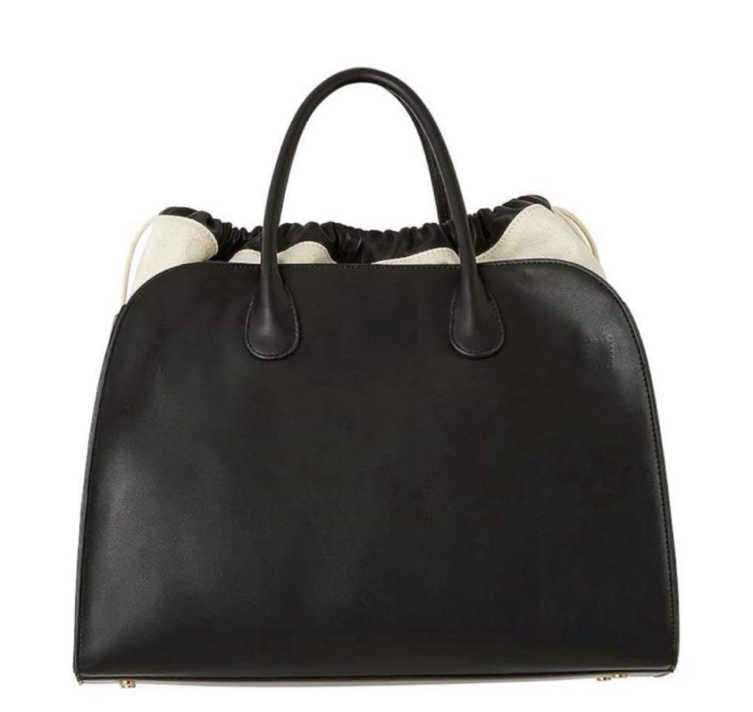 Mila Owen ★ 巾着付きラージボストンバッグ Mila Owen（ミラオーウェン）の「巾着付きラージボストンバッグ