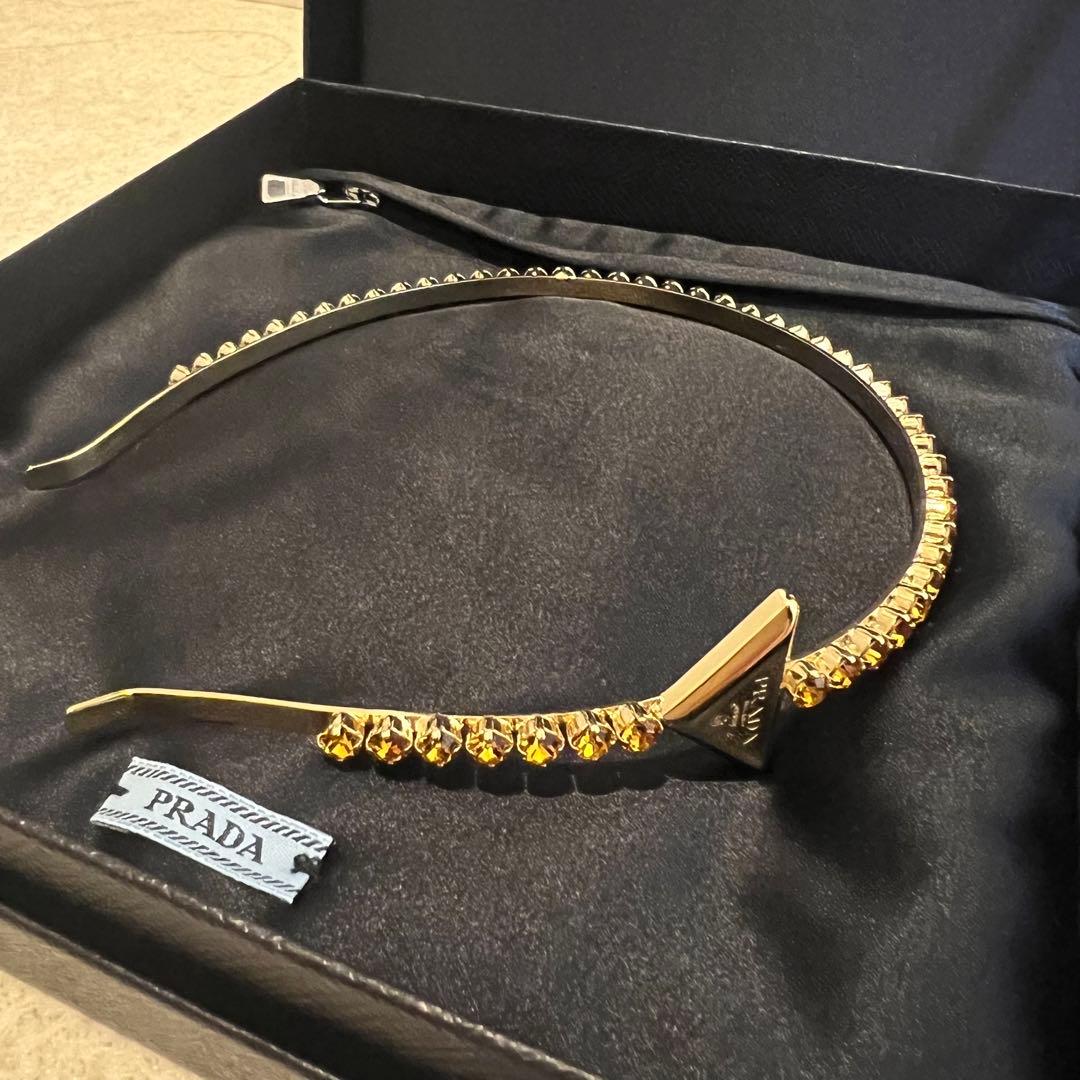 PRADA カチューシャ ゴールド 新品未使用 - メルカリ