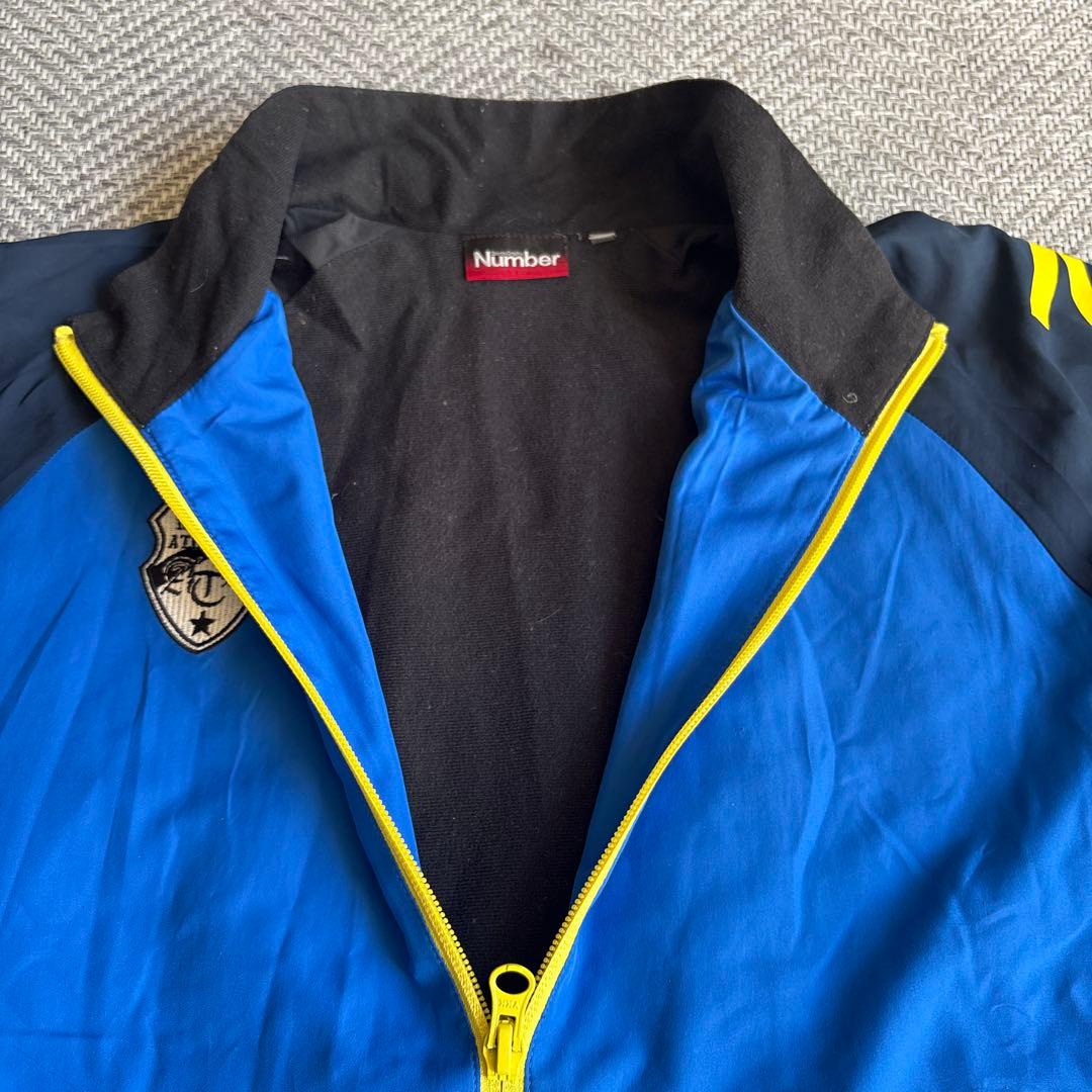 Number ピステ・ウィンドブレーカー 青黒 - メルカリ