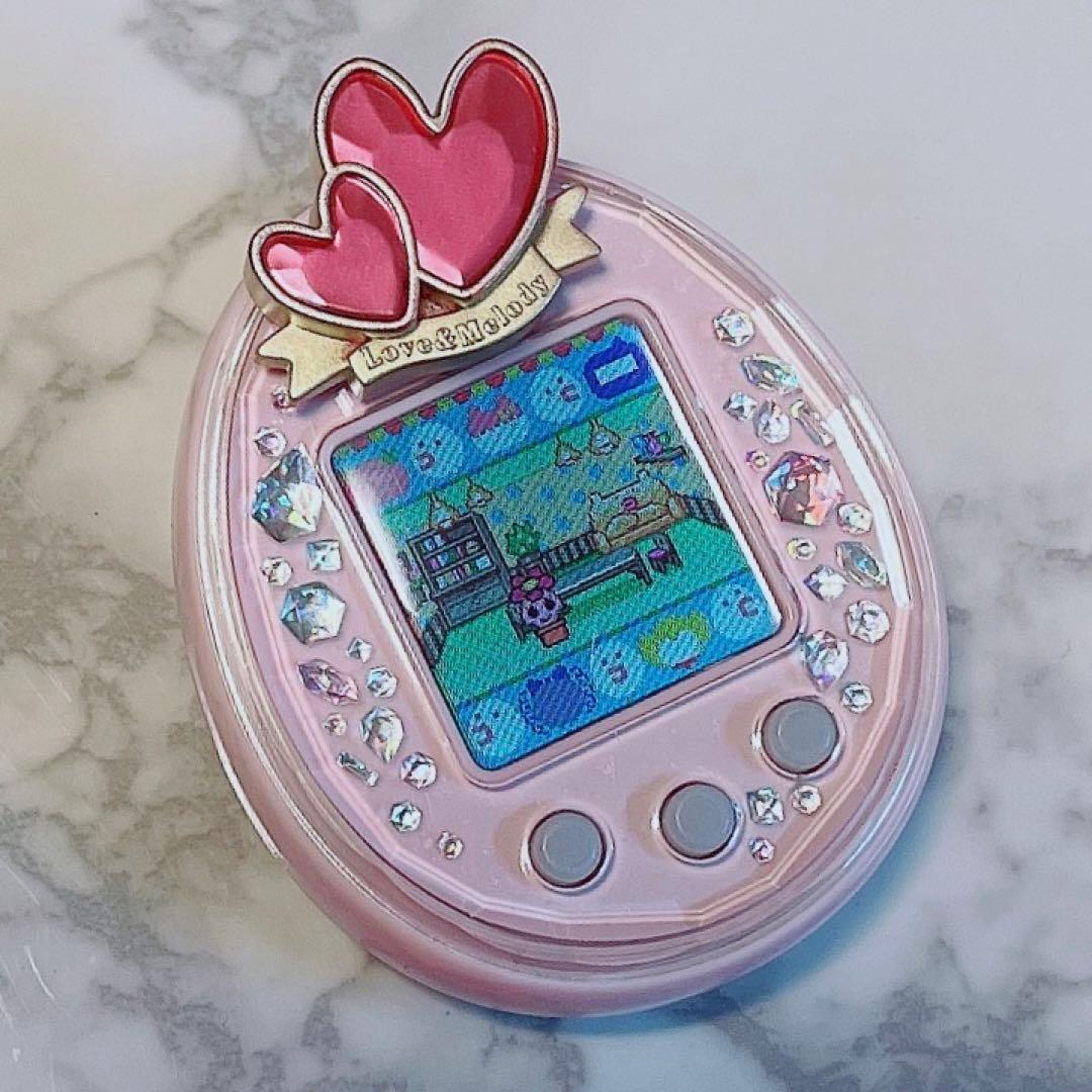 たまごっちピース ピンク たまデコピアス ラブメロver. セット - メルカリ