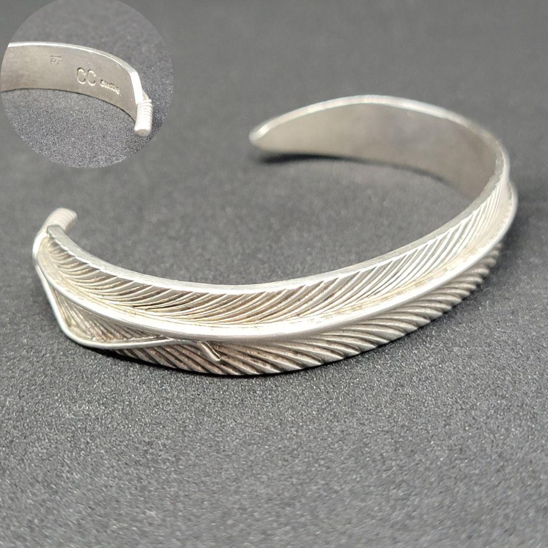 ナバホ族】クリスチャーリー作 CHRIS CHARLEY フェザーバングル - メルカリ